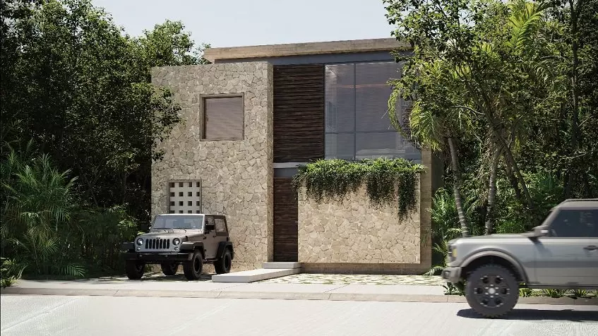 Facade of a brown house and 2 parked cars in Villa Amore