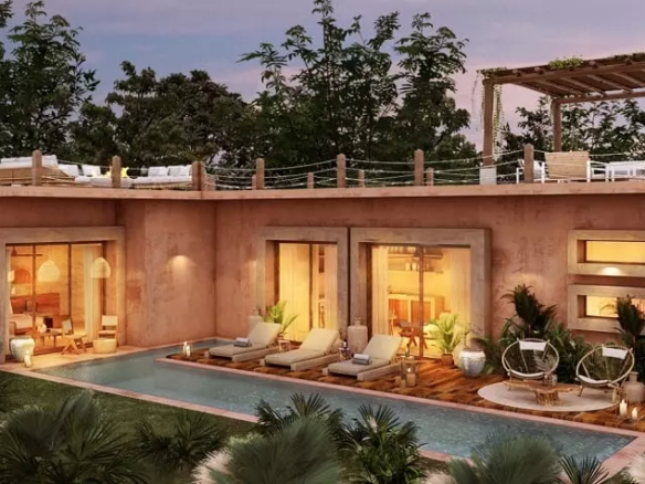Terrace facade and a pool with lounge chairs at Terra Private Villa