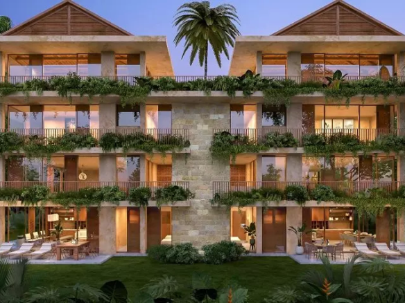 Facade of 2 apartment buildings with pool in Artila Tulum