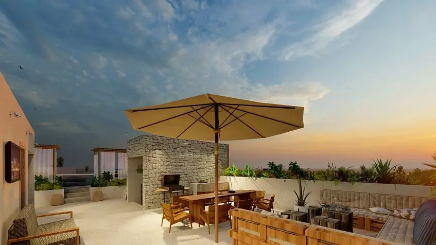 Garden umbrella and lounge area on the rooftop at Xkaa Downtown Condos