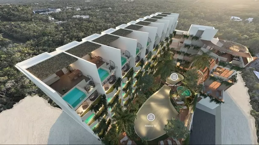 Aerial view of residential building, rooftops with plunge pools, ground floor garden at Naj Origen Tulum