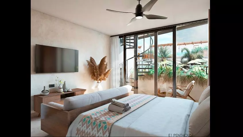 One bedroom with a balcony, a chair and a ladder in Kukulkan Tulum