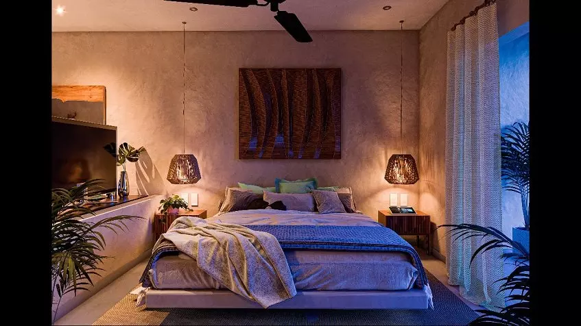 A bedroom with a decorative painting, large curtains in Core Tulum