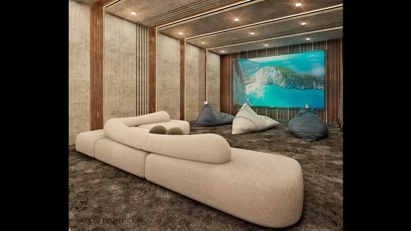 A private cinema room with a large sofa Kukulkan Tulum