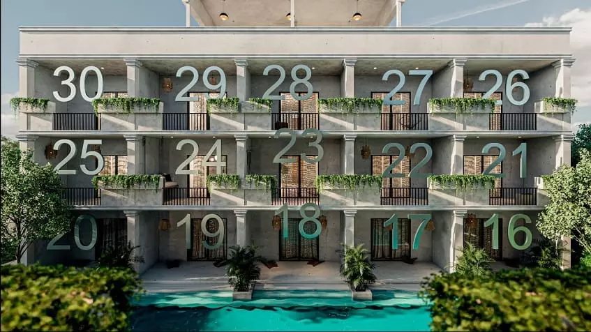 Facade of a building with an apartment and a pool in Core Tulum