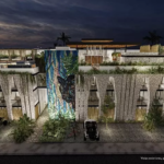 Residential building facade, black jaguar painted, 2 cars parked in front at Zamajal Tulum
