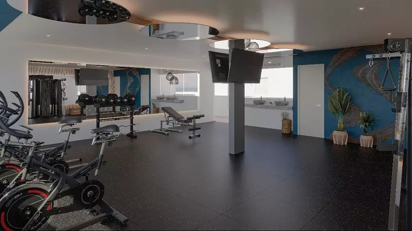 Gym with sport equipment and long mirror at Edzna Tulum
