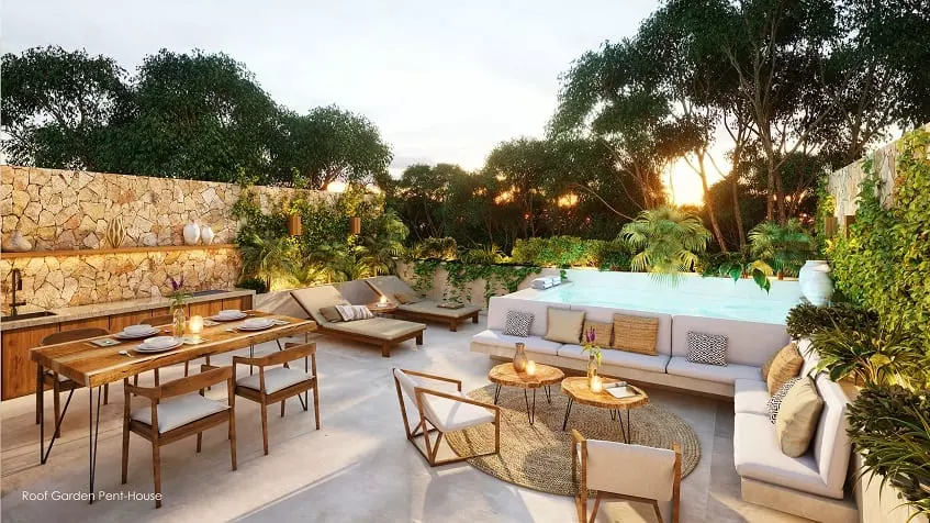 A terrace with a jacuzzi, lounge chairs and chairs in Neuquén del Mar Tulum
