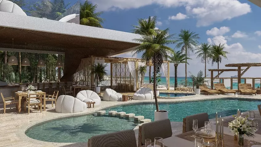 A Beach Club with pool, restaurant, sun loungers and ocean view at Mara Bella Cancun