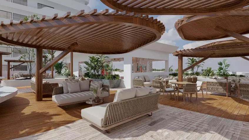 A terrace with sofas around it at Marbella Cancun