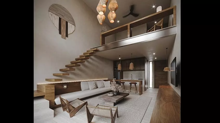 A large living room with a sofa and an upstairs bedroom in Grand Selva Tulum