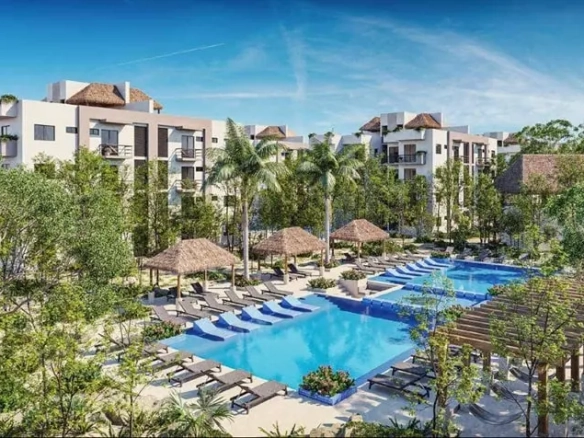 An aerial view of a swimming pool with lounge chairs at Selva Escondida