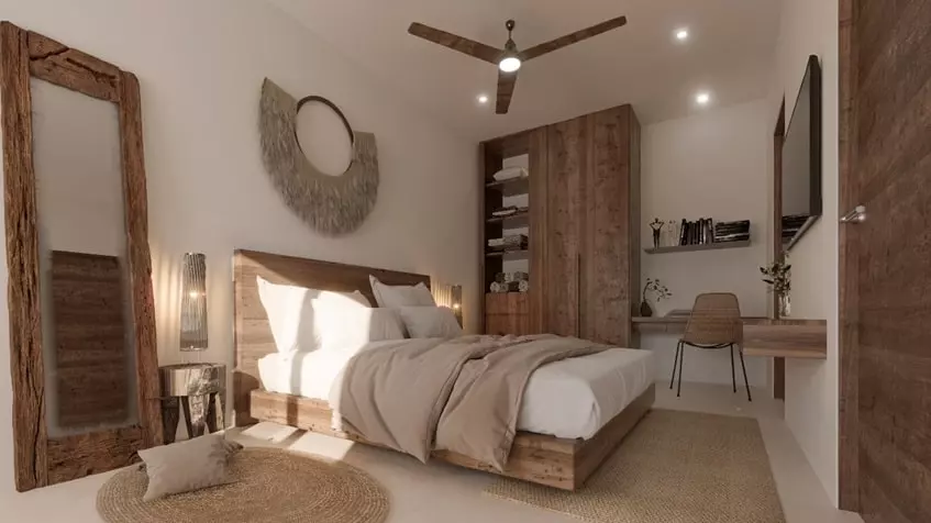 A master bedroom with a large mirror and closets at Fabula Tulum