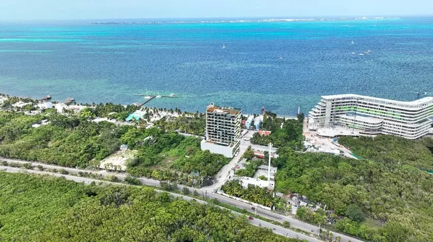 Aerial view of an oceanfront development at Dharana Tower Cancun