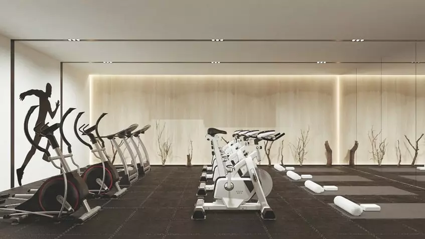 A gym with yoga mats at Dharana Tower Cancun