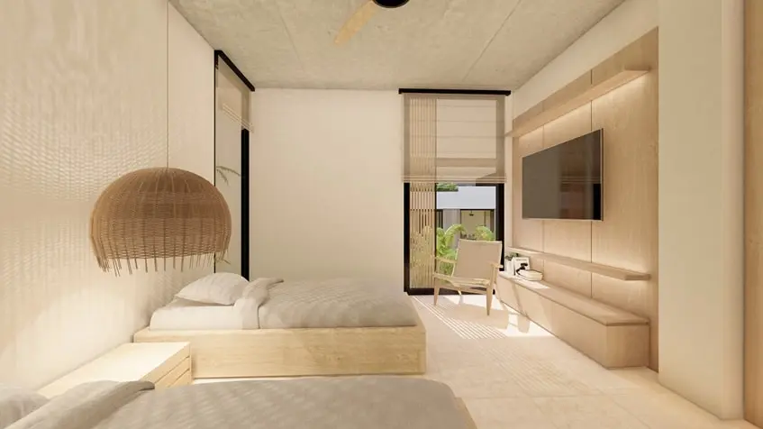 One bedroom with a tv and a balcony in Bakaba Playa del Carmen