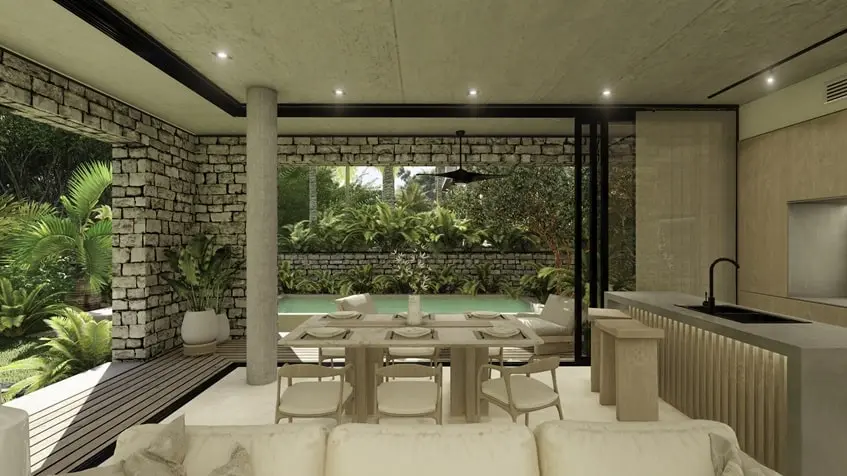 A dining room with gardens and a view of the private pool at Bakaba Playa del Carmen
