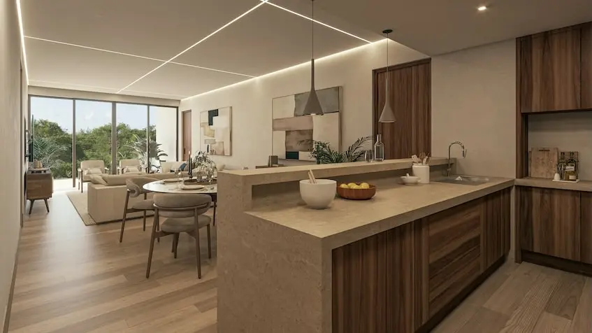 A kitchen and dining area in Oceanna Residences Playa del Carmen