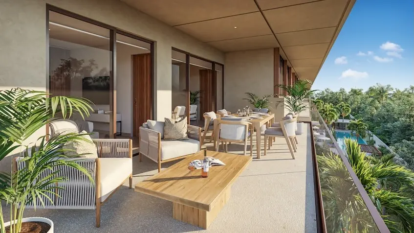 A Terrce with furniture and a table in Oceanna Residences Playa del Carmen