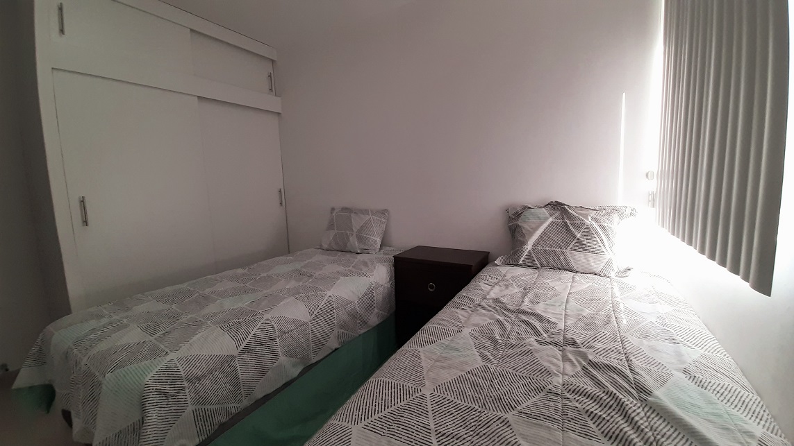 Recamara con dos camas individuales en Punta Estrella