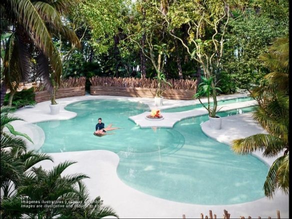 Piscina rodeada de vegetación y un hombre enseñando a nadar a una mujer en Bak Tulum