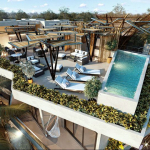 Rooftop view with pool, sundeck, and lounge at Rama Tulum