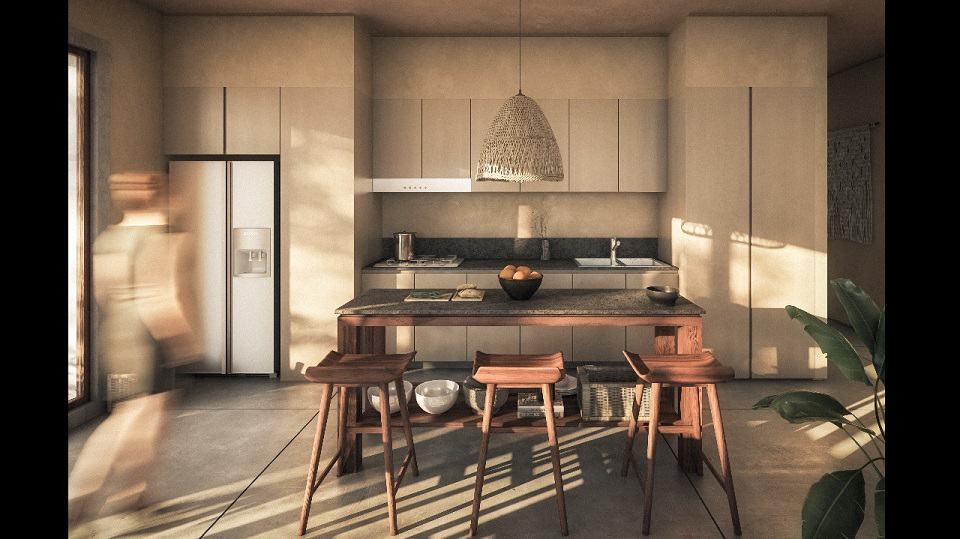 Cuisine avec table à manger et tabourets dans les appartements Koh
