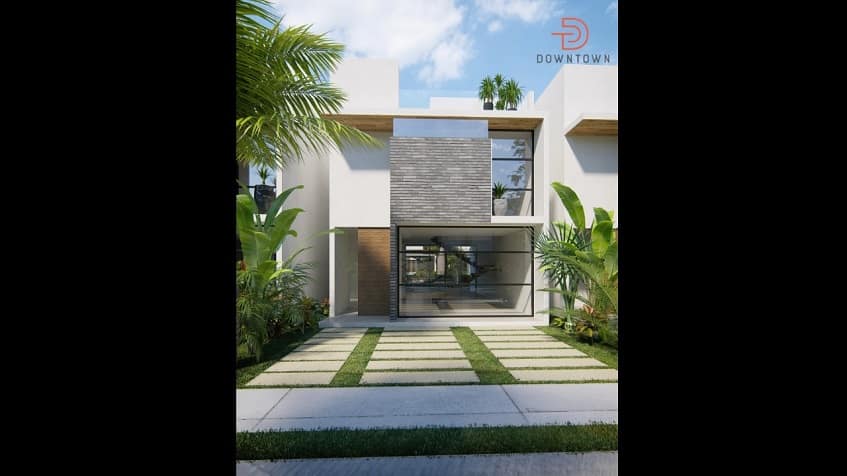 Fachada de casa con mini jardín al frente en Downtown en Tulum