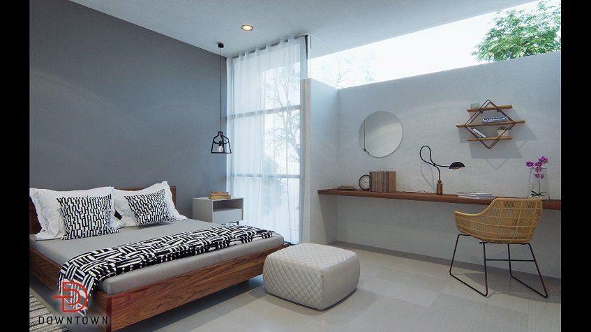 Dormitorio con ventana grande y escritorio banco en Downtown en Tulum
