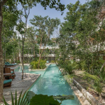 River-shaped garden pool in Copal Tulum