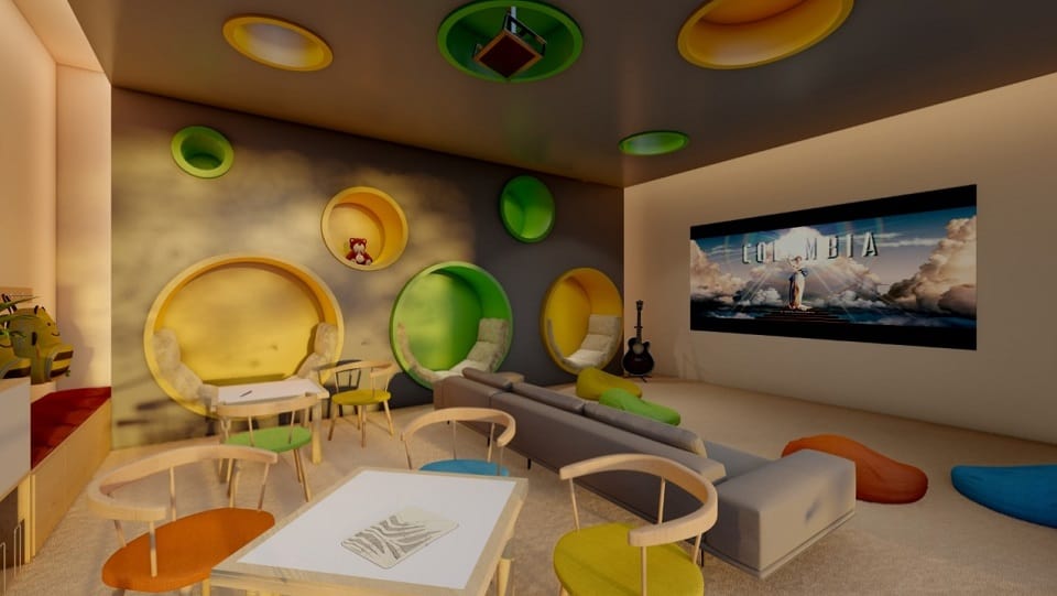 Sala de juegos colorida para niños con asientos circulares integrados en la pared y pantalla de mini cine en Kaab at the Park