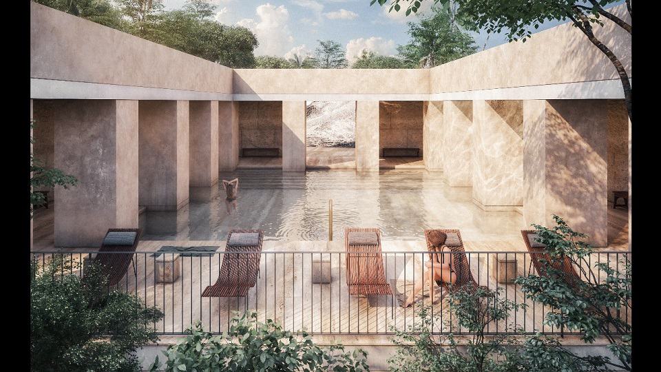 Piscine entourée d'une construction en béton et une femme assise sur une palette à Koh Apartments
