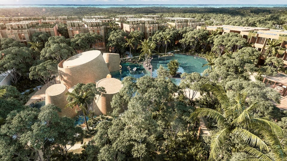 Área Residencial en la selva con piscina en el medio en Aflora Tulum