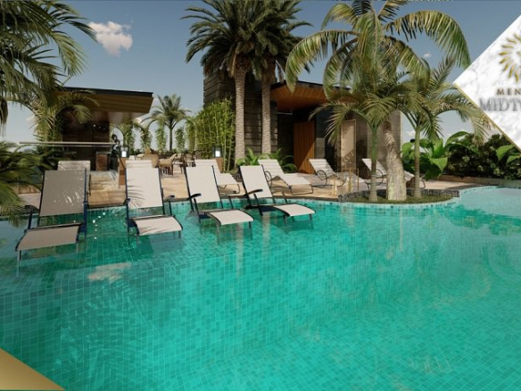 A pool with four sun loungers in the water surrounded by vegetation in Menesse Midtown 2
