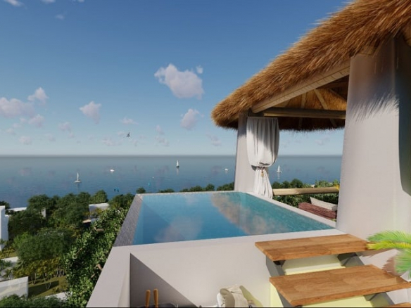 Piscina en la azotea, palapa y vista al mar en Nativo Cozumel
