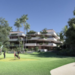 Parcours de golf avec trois personnes jouant devant la réserve de Mayakoba