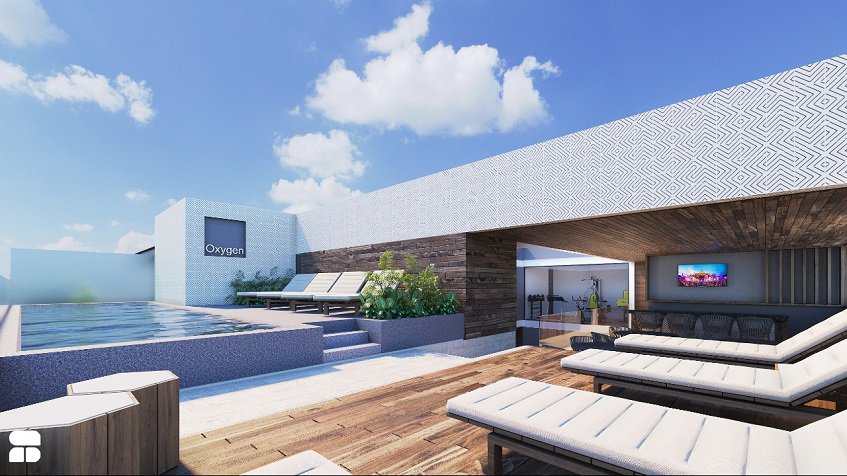 Azotea con piscina rodeada de solárium en Oxygen 5th. Ave. Residencias