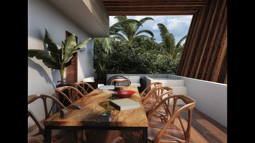 Upper terrace with jacuzzi and large dining table at Asana Leaf Tulum