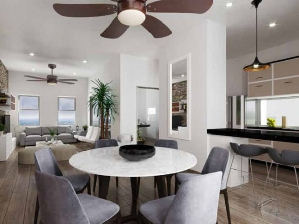 Kitchen and dining room with living room in the background at StarLight Towers