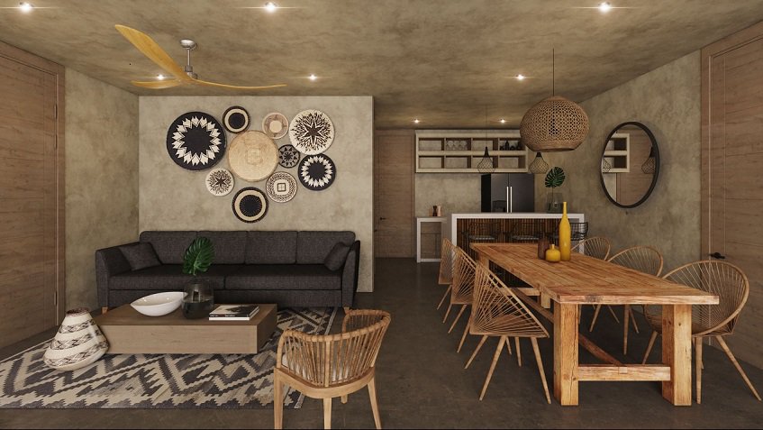 Dark living room with wooden chair at Irie Tulum