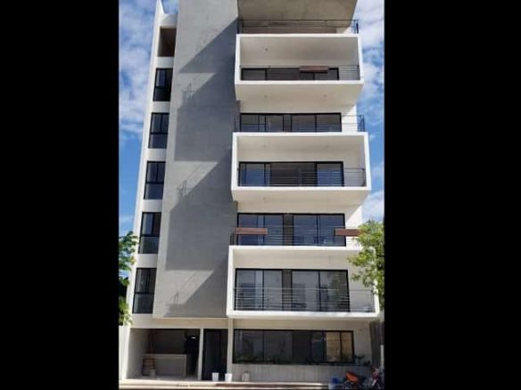 White residential building at Amaya Apartments