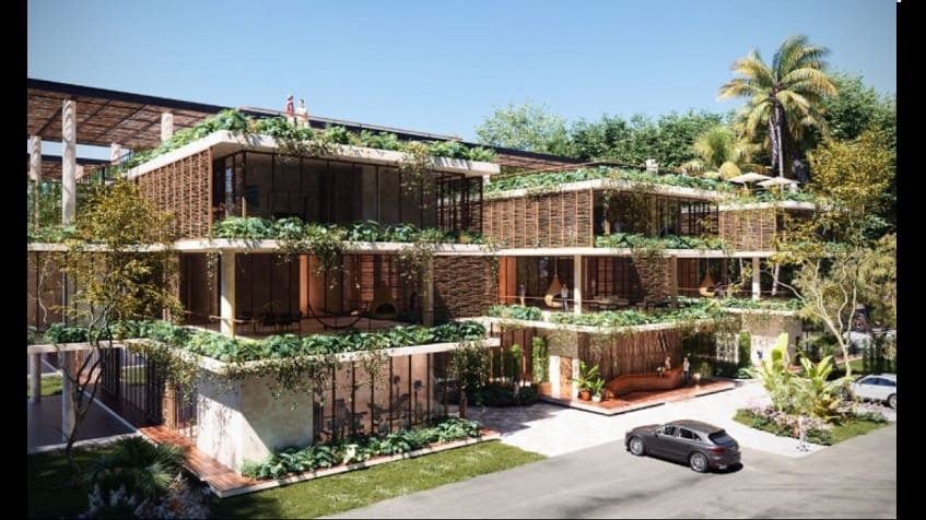Vista frontal de la fachada del edificio residencial en Amelia Tulum