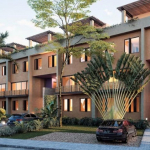 Façade d'un condominium de quatre étages et une voiture garée face à Aleda Playa