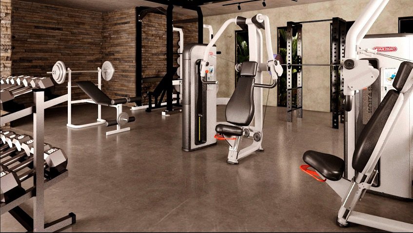 Gymnasium with weights and other fitness tools at Irie Tulum