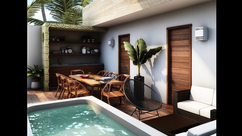 Upper terrace with jacuzzi and large table at Asana Leaf Tulum