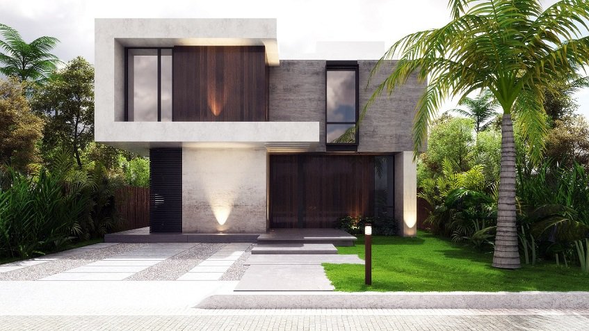 Fachada de casa con estacionamiento y zona verde en Aldea Paraiso