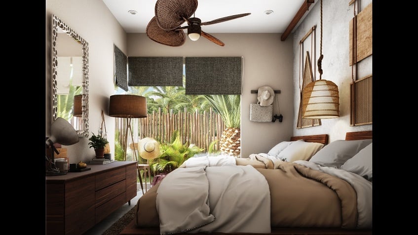 Bedroom with two double beds and mirror at the front in Asana Leaf Tulum