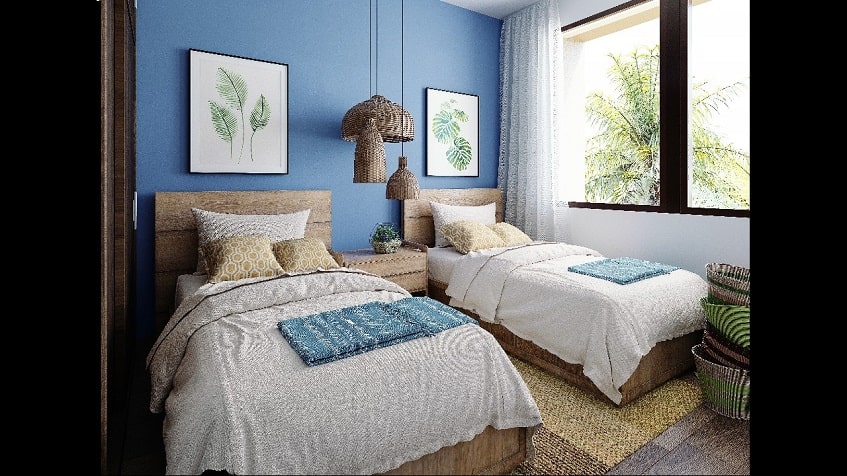 Bedroom con dos camas individuales y cuadros de hojas verdes en Aleda Playa