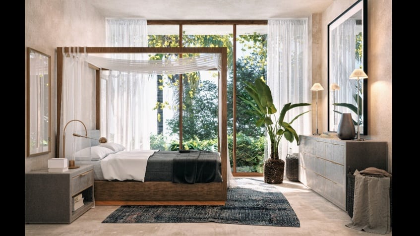 Recamara con cama frente a enorme cuadro y terraza en Amelia Tulum