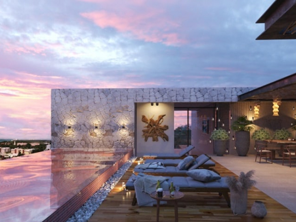 Azotea con piscina infinita de tejas rojas en Galia Naturalmente Cozumel